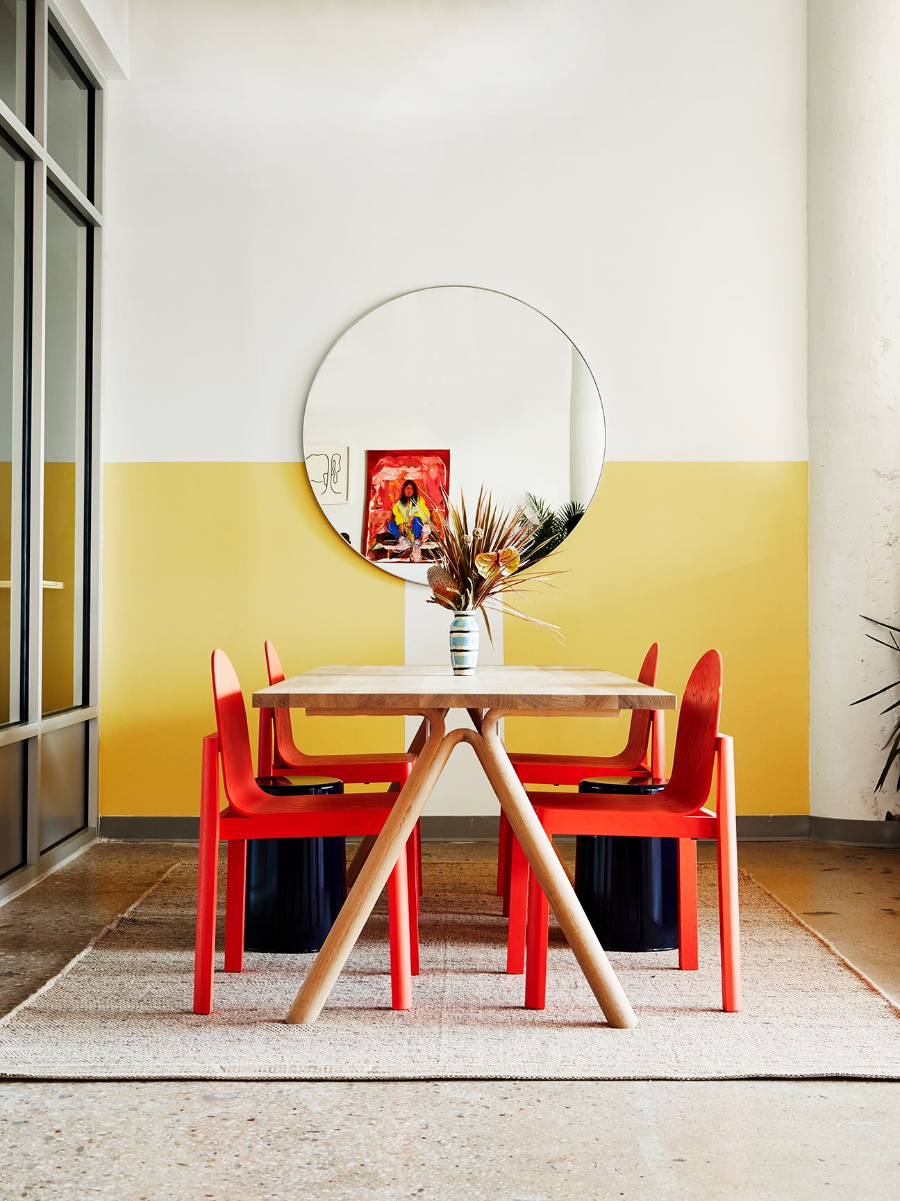 Dining area with red chairs