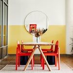 Dining area with red chairs