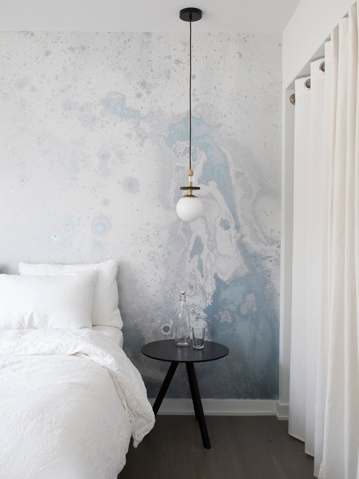 blue marbled wallpaper in bedroom