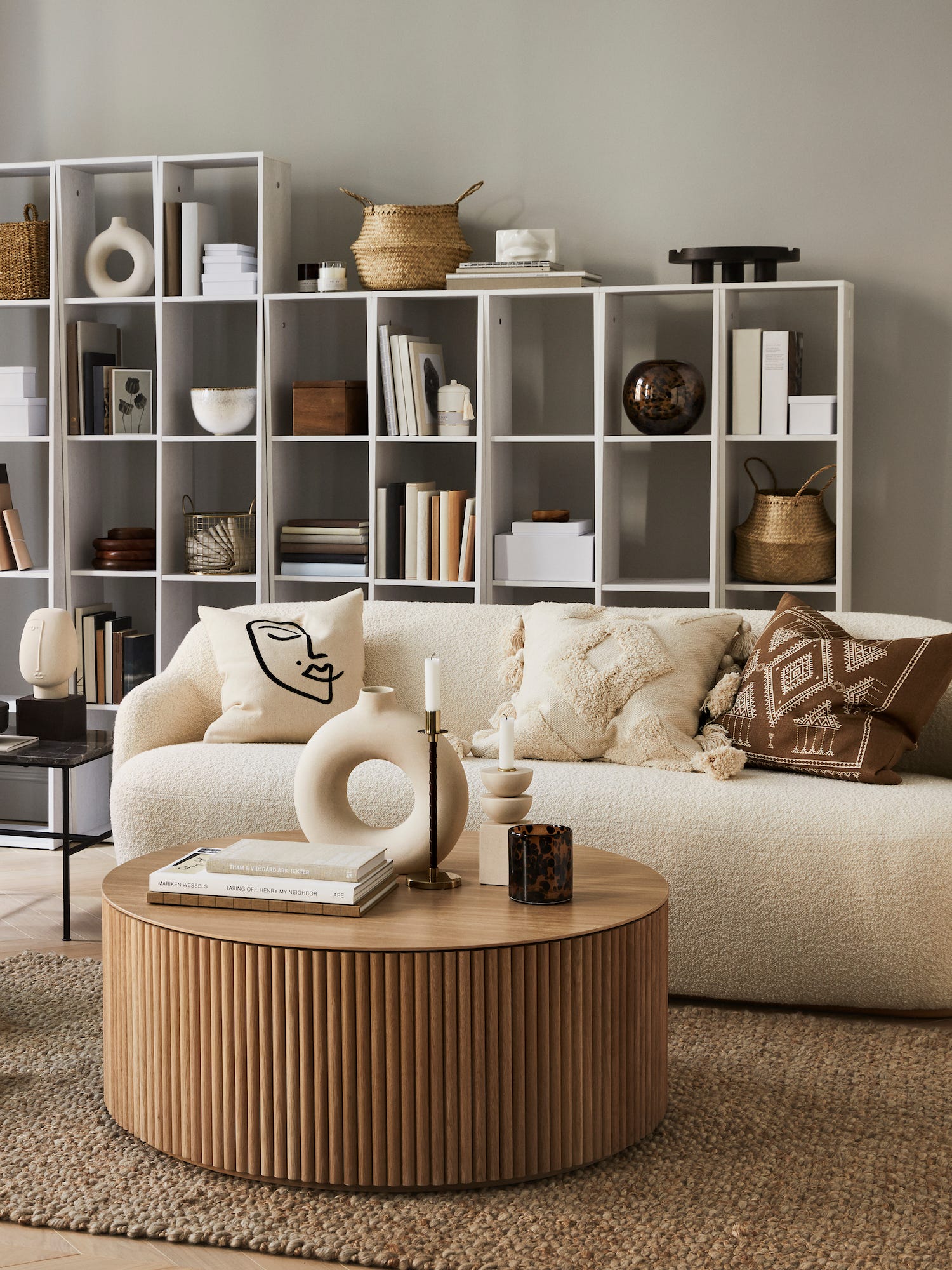 living room with round rattan coffee table