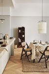 dining table with pendant and linen tablecloth