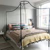 Bedroom with metal canopy bed