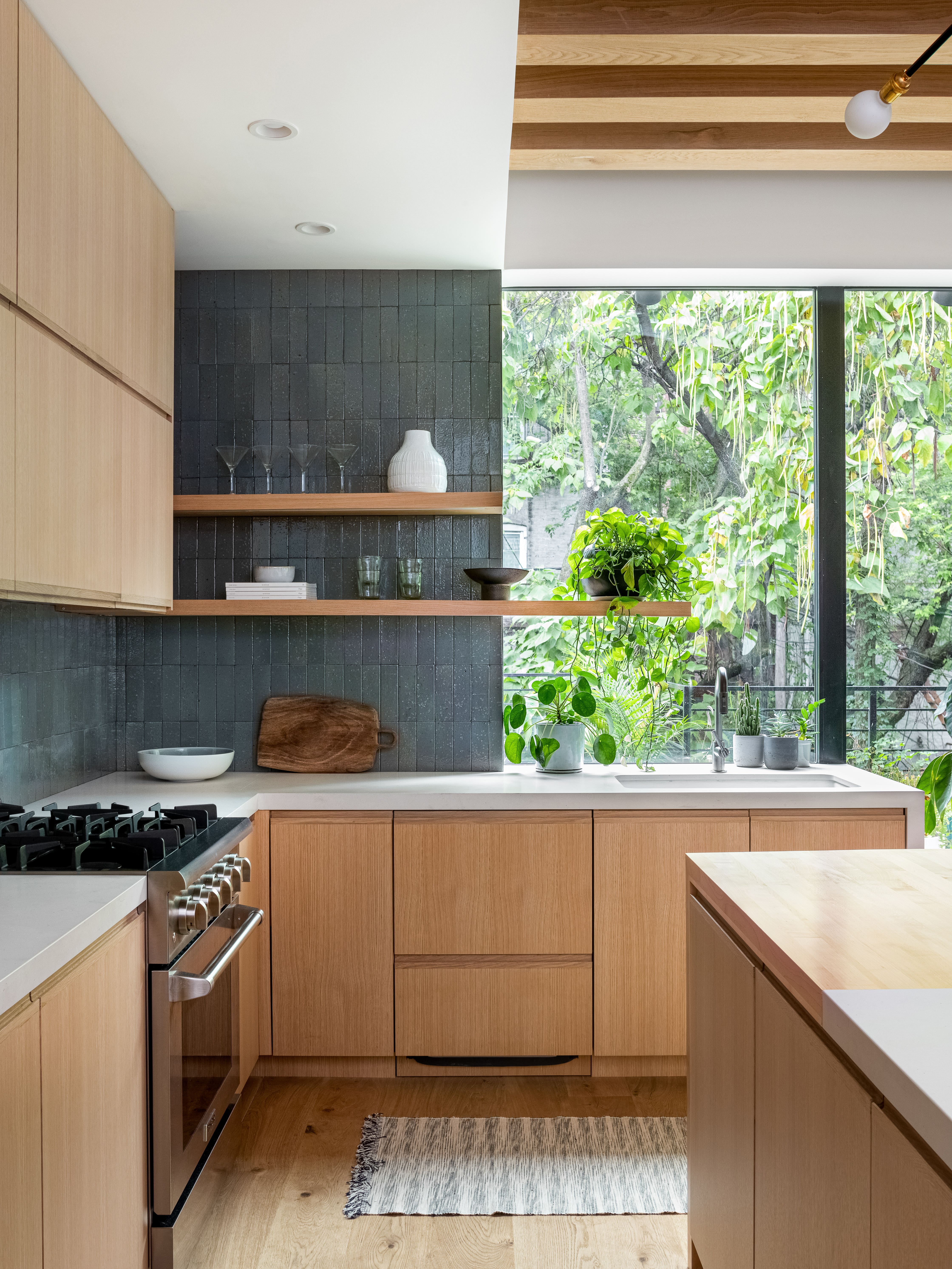 Modern kitchen with floor-to-ceiling windows