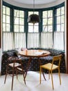 Kitchen breakfast nook with curve banquette
