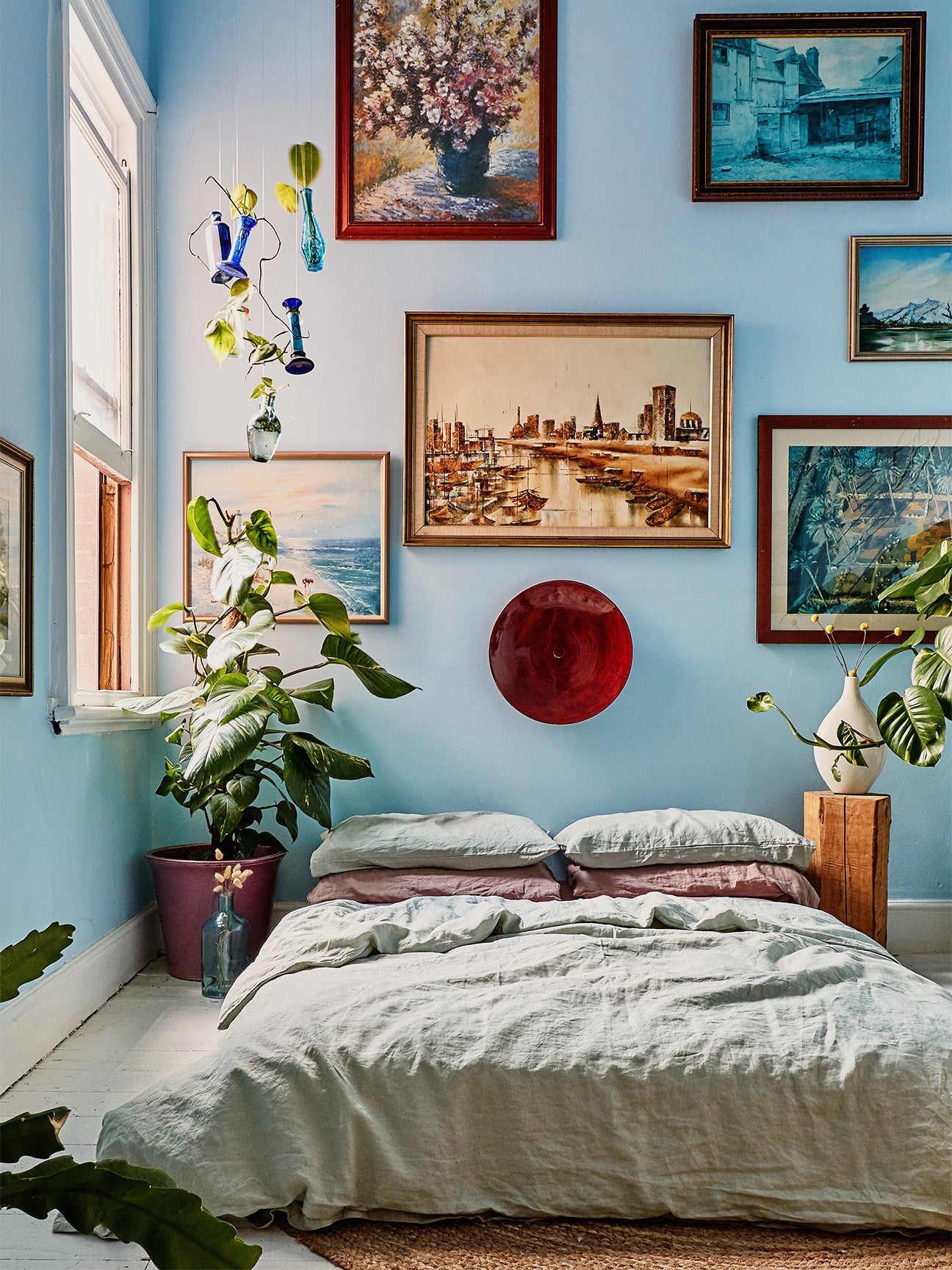 Blue bedroom with plants