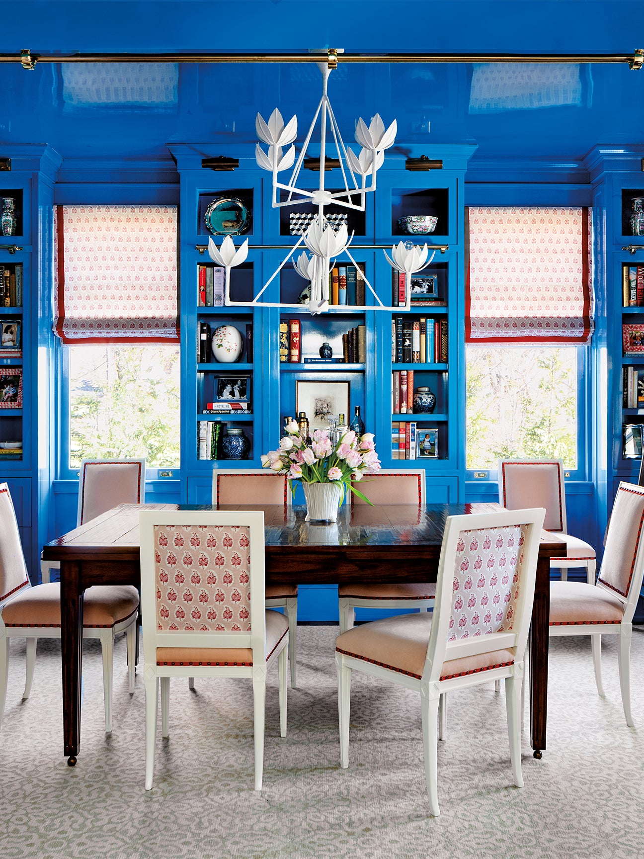 Cobalt blue dining room with red accents