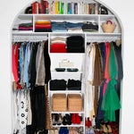 Closet with arched doors