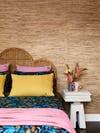 Bedroom with seagrass wallpaper