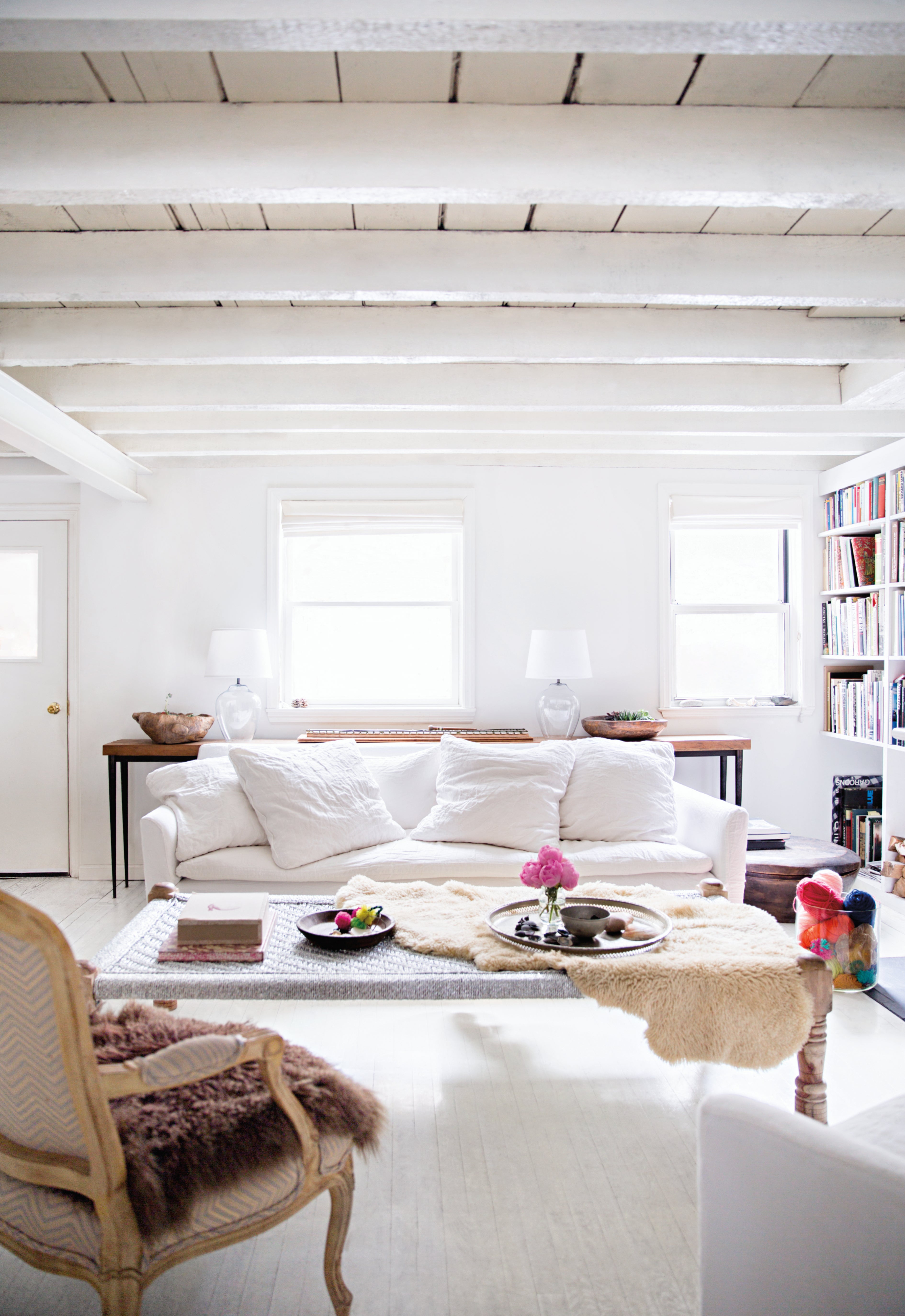 whitewashed living room with exposed beams