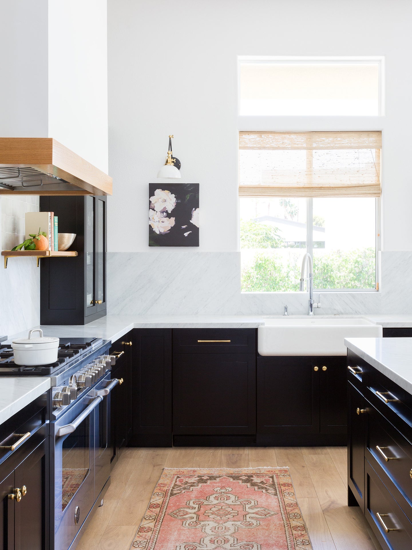 black and white kitchen with big window