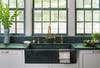green soapstone counters with farmhouse sink