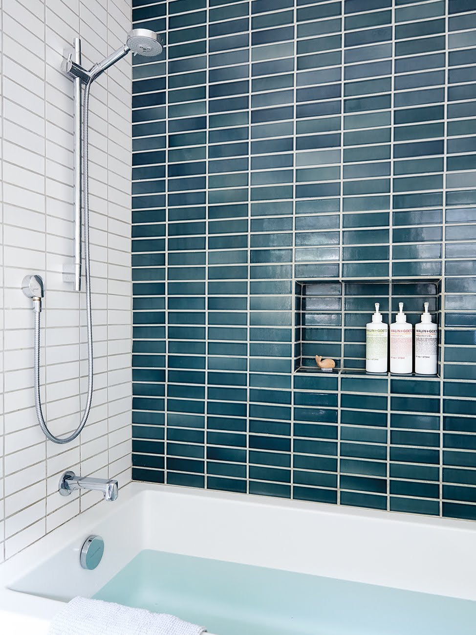 Shower with blue tiles