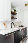 kitchen with black cabinets and open shelving