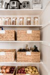 woven baskets in pantry