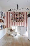 Kids room with striped wallpaper
