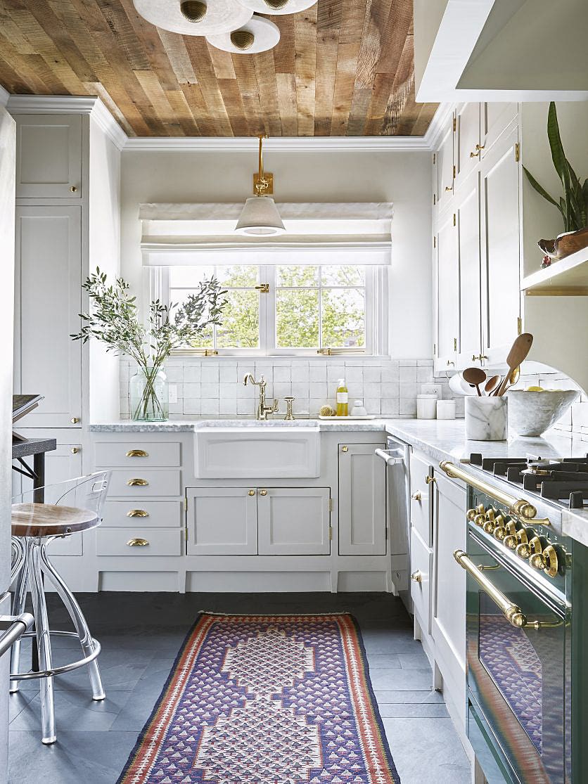 White kitchen with green stove