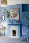 light blue room with fireplace