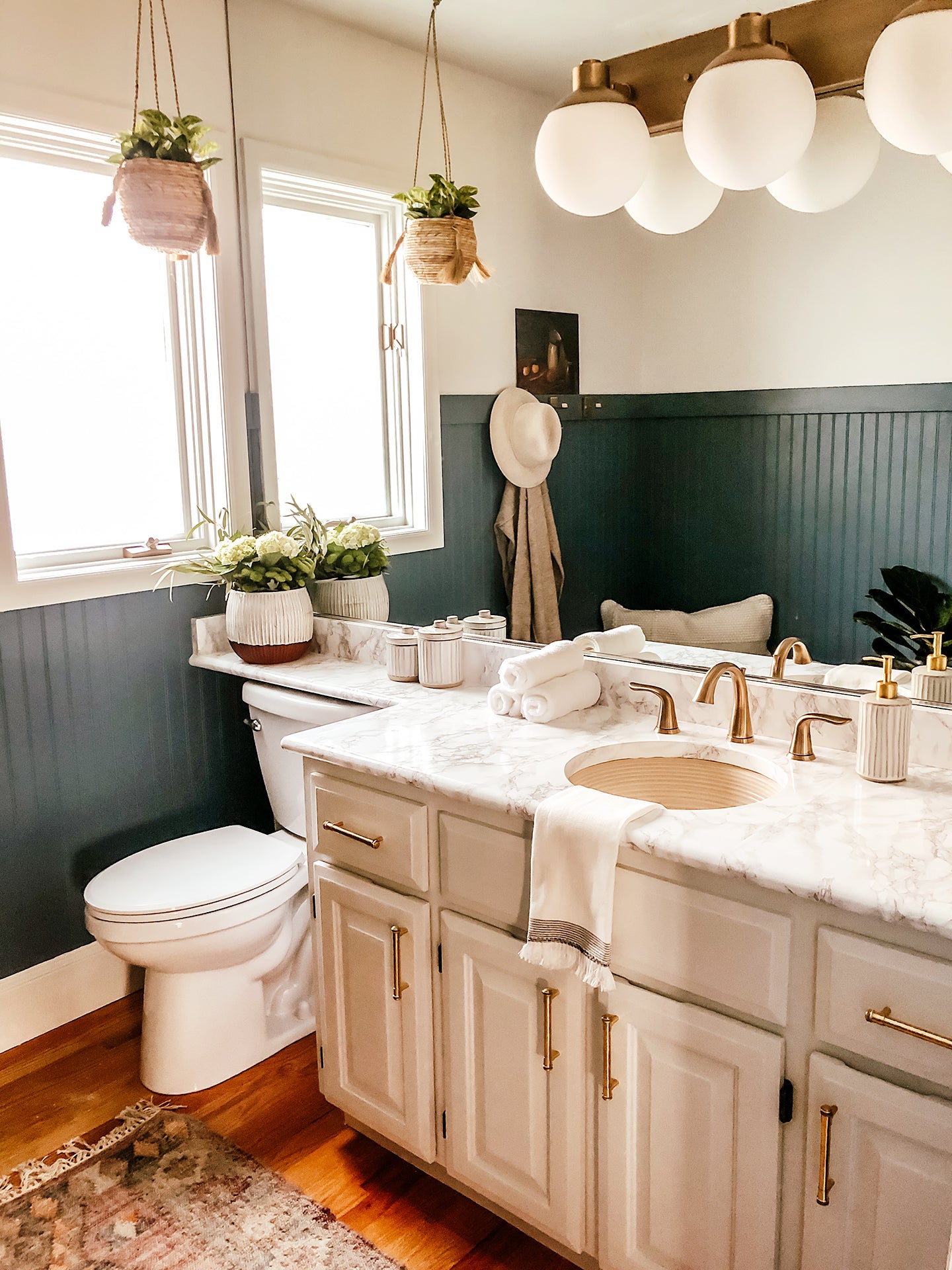 blue bathroom with white counters