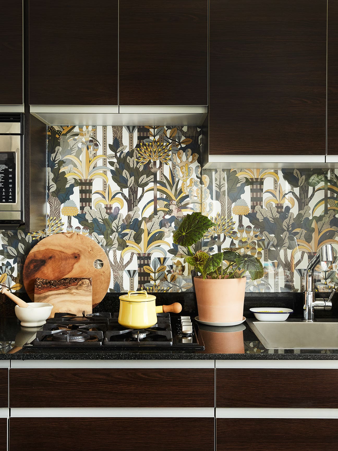 Kitchen with wallpapered backsplash