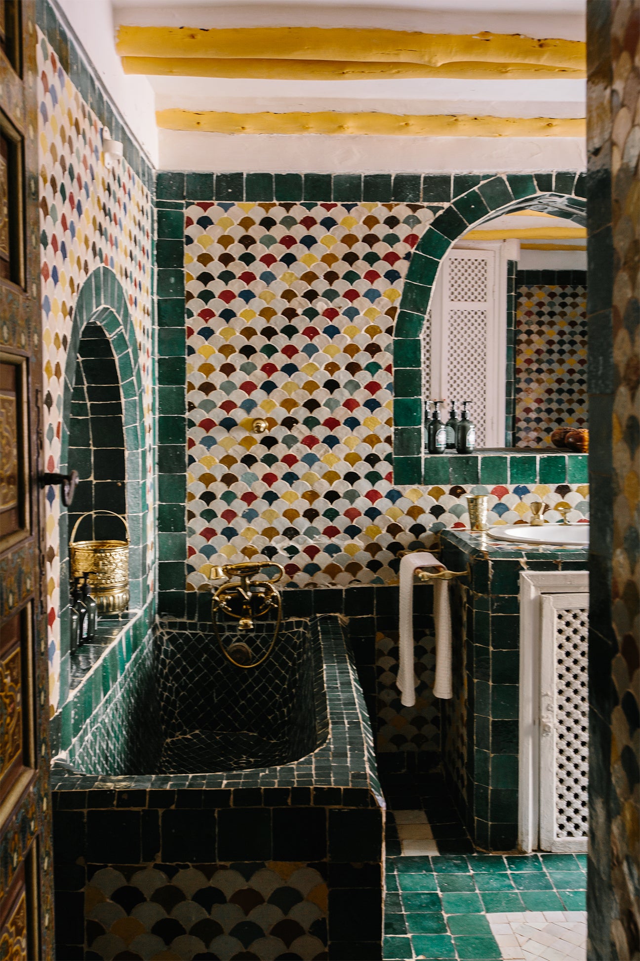 moroccan bathroom with colorful tiles