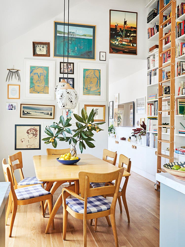 dining room with large gallery wall