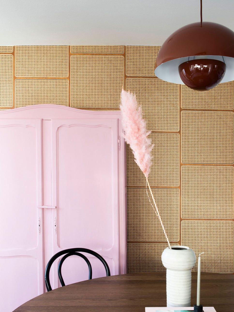 cane wallpaper in a dining room