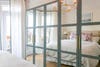 bedroom with mirrored wall
