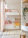 pink and orange kids bedroom with bunk bed