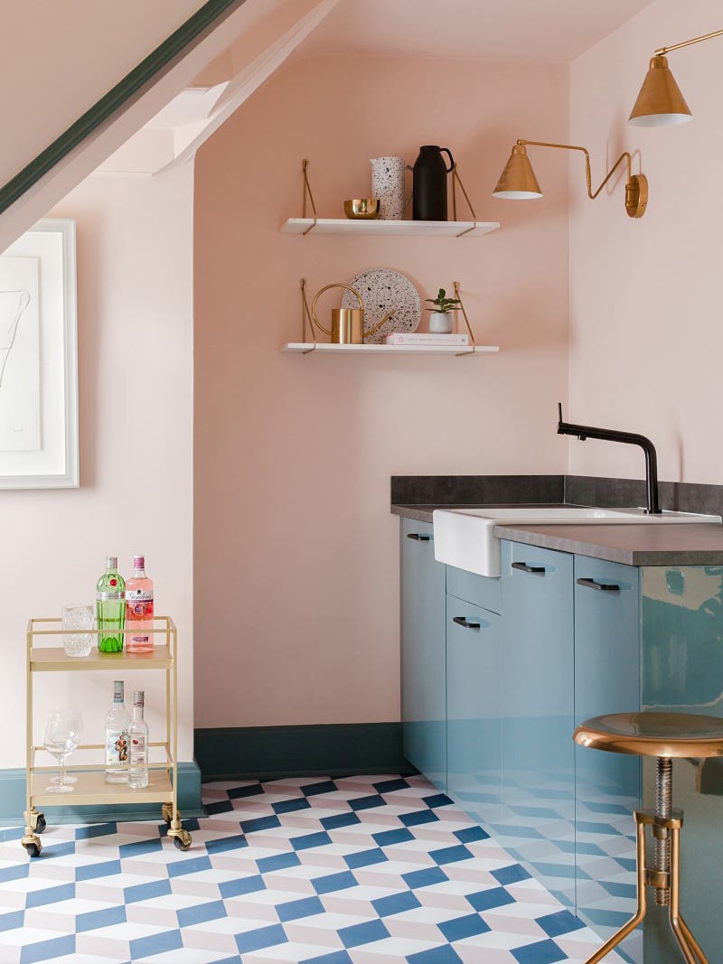 pink kitchen with blue tile floors