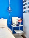 bright blue wall bedroom