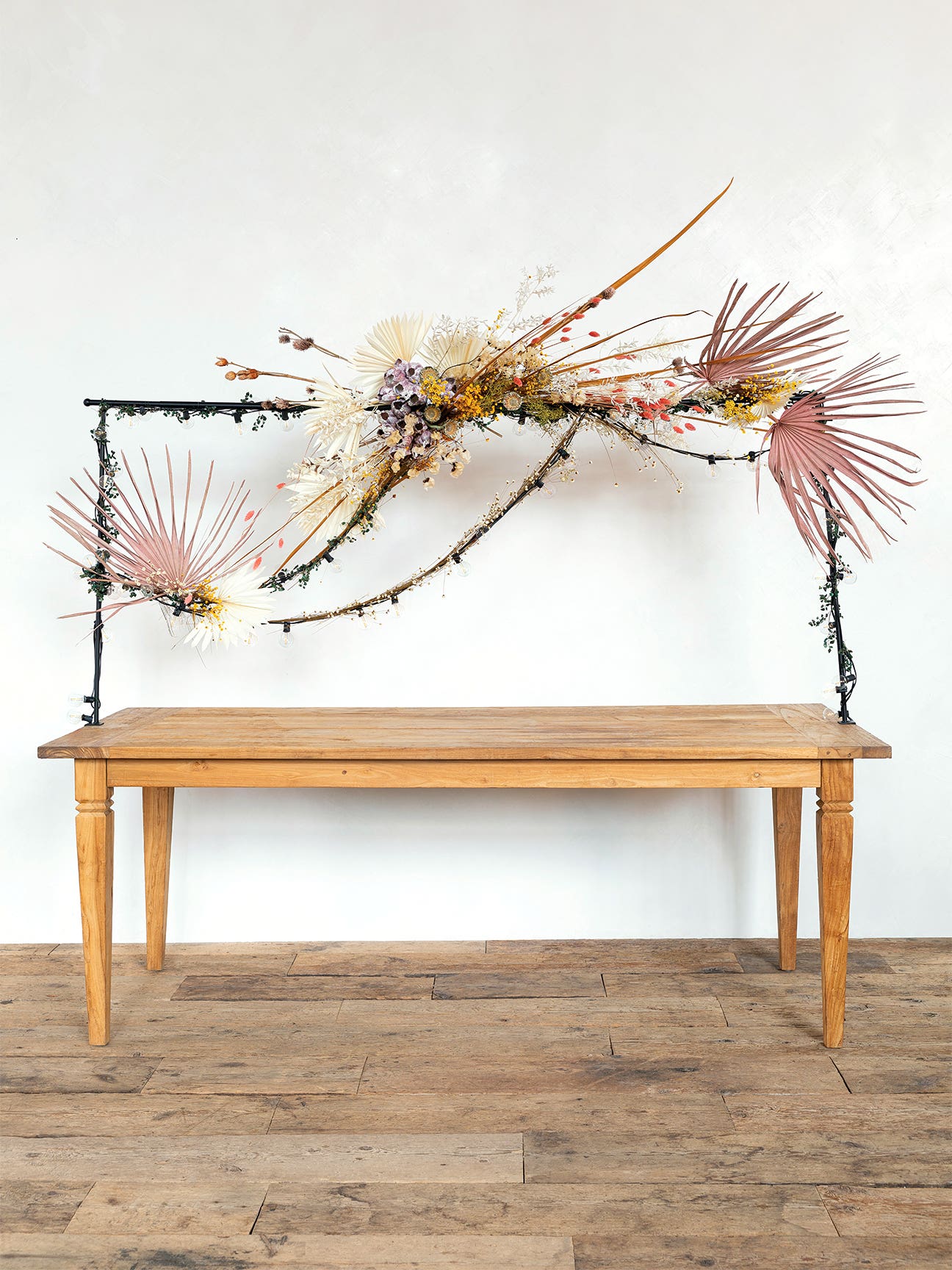 table with floral installation