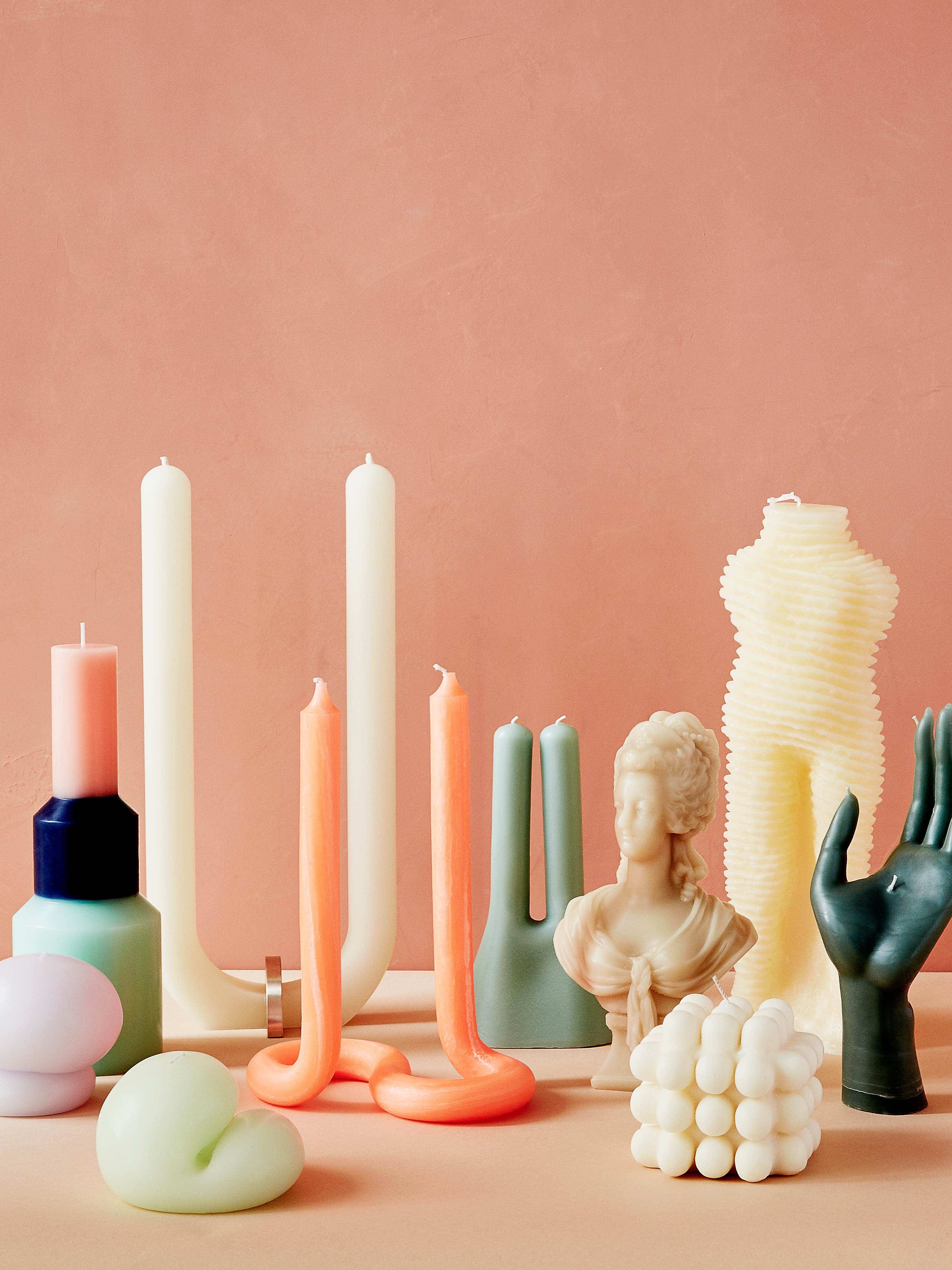 arrangement of uniquely shaped candles