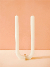 White U-shaped candle