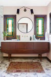 pink bathroom with stained glass windows