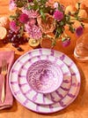 purple ceramic plates on a table