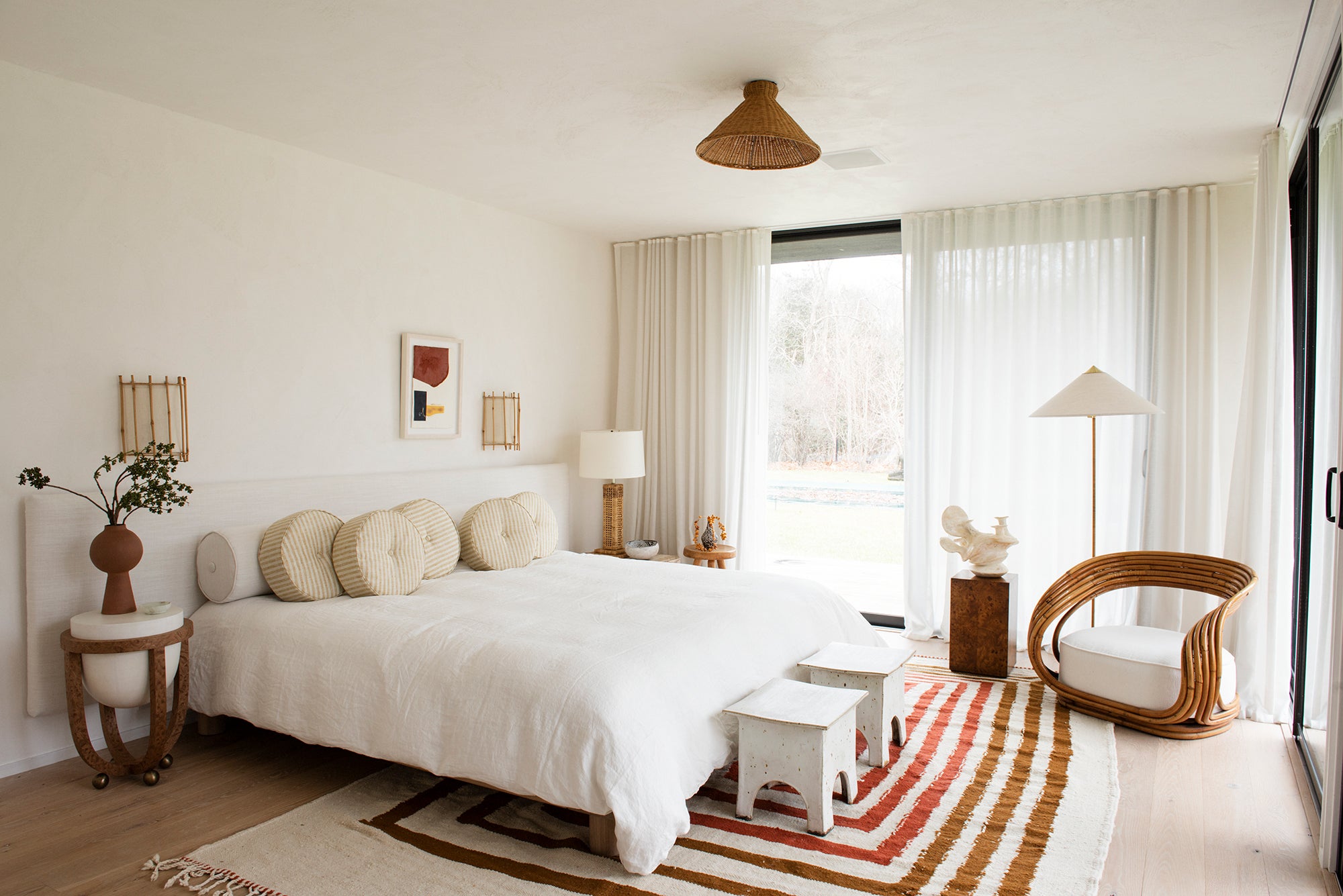 graphic striped bedroom rug and neutral bedding