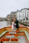 couple kissing on a boat