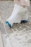blue shoes and white dress
