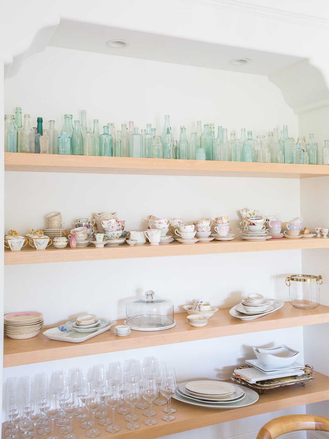 Open shelves with assorted glassware