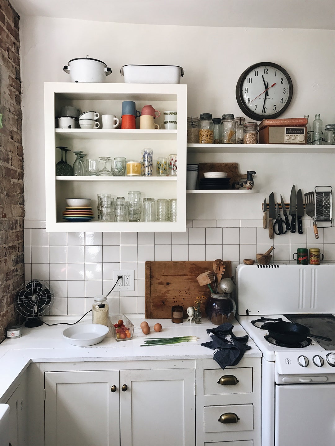 White kitchen with open shelving