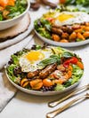Salad with egg on top