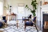 navy blue armchairs and moroccan rug
