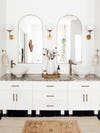 white bathroom vanity with gray counters
