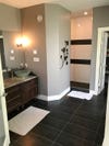 black stone bathroom floors and gray walls