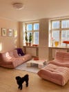Living room with pink sofas