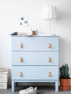 blue dresser with leather pulls