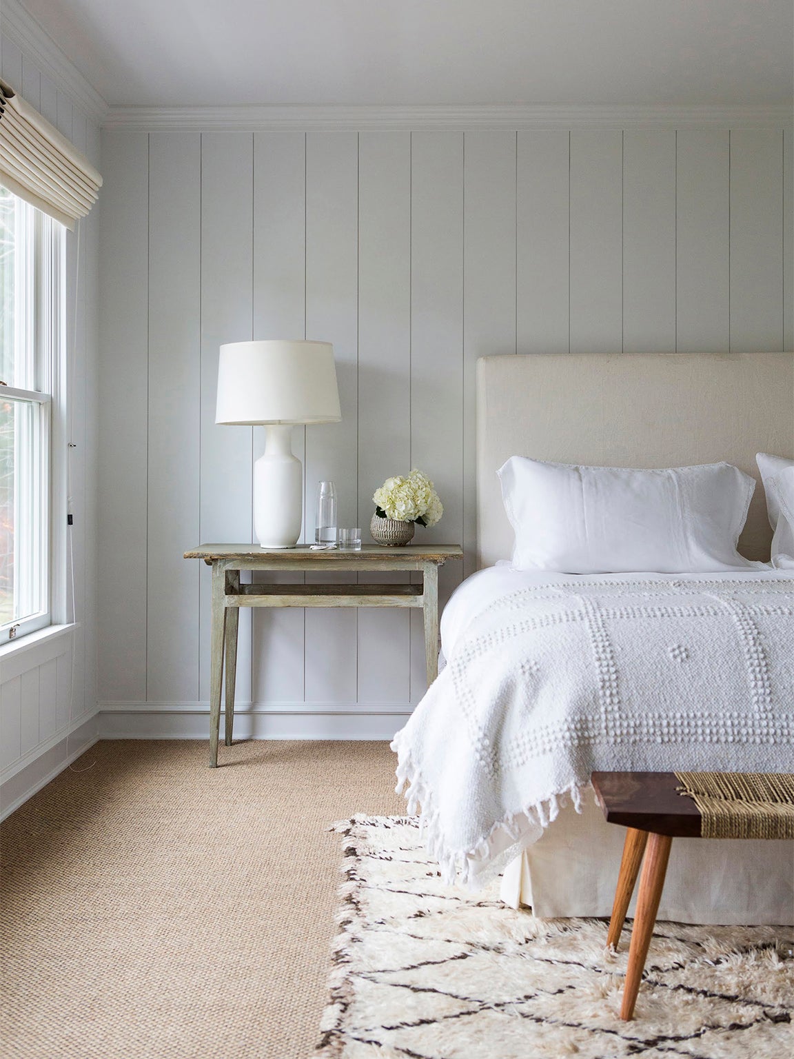 white and cream colored bedroom