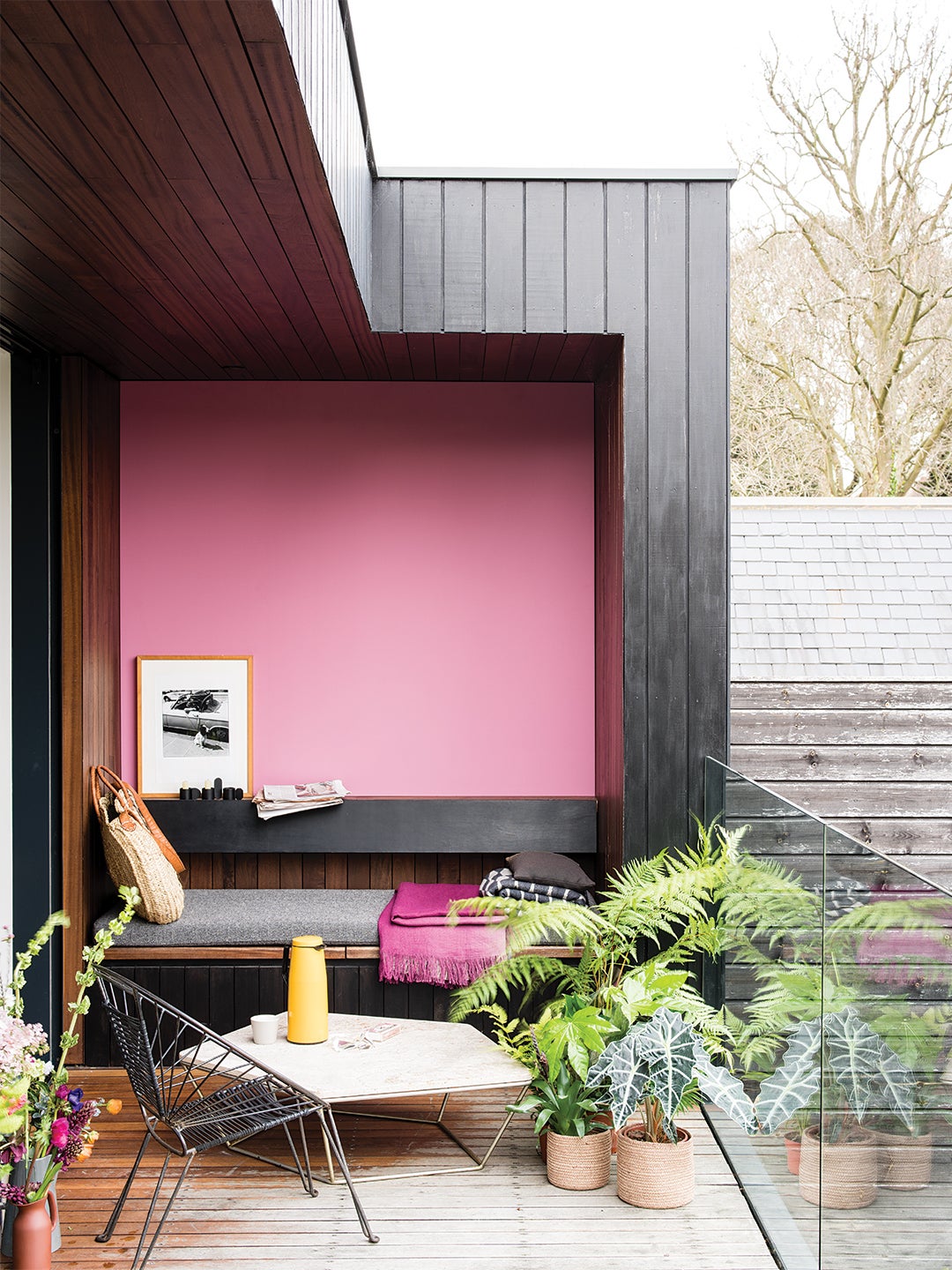 pink outdoor patio with lounge chair