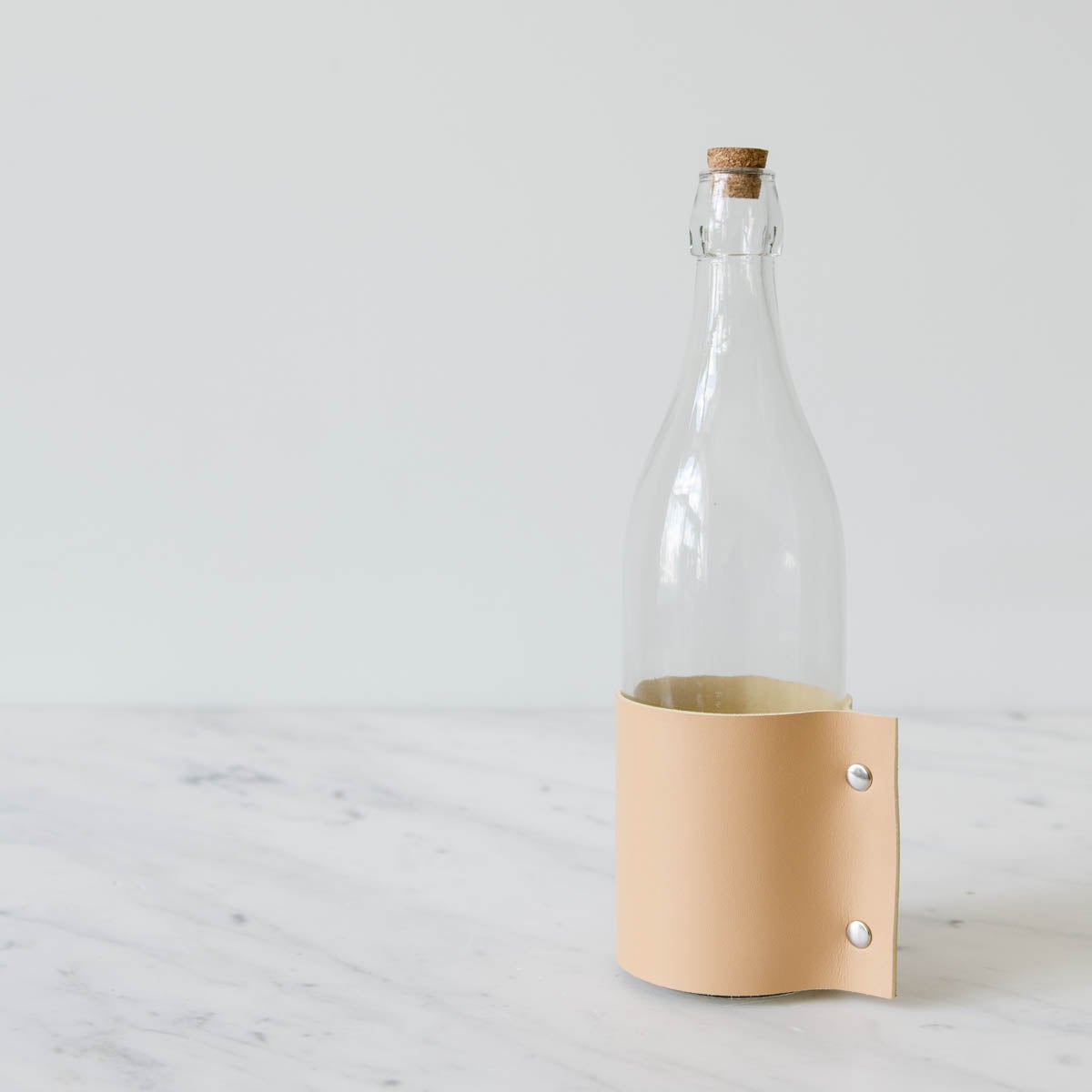 GLASS-BOTTLE-WITH-LEATHER-WRAP-WEBSITE