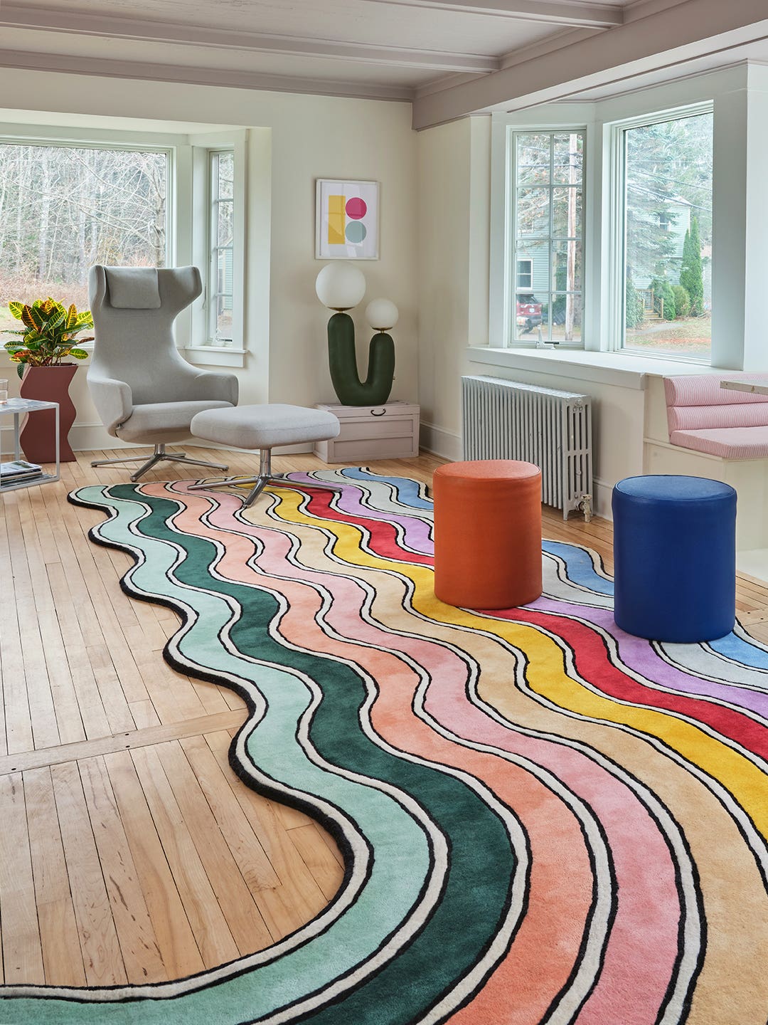 rainbow rug and colorful stools